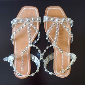 Jeffrey Campbell flat sandals.